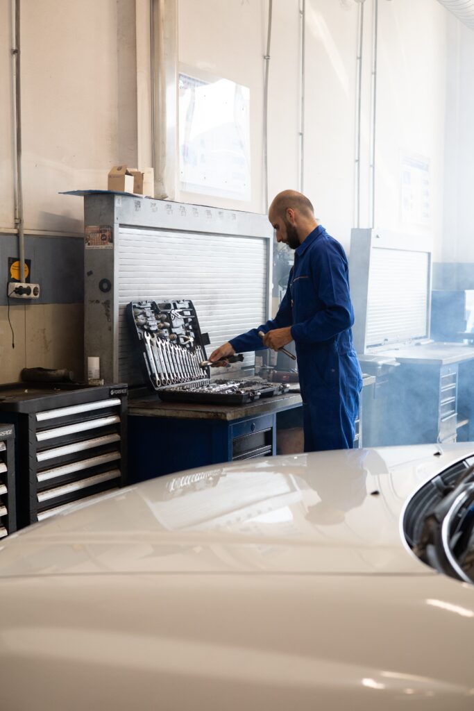 Man in garage searching for the best tool