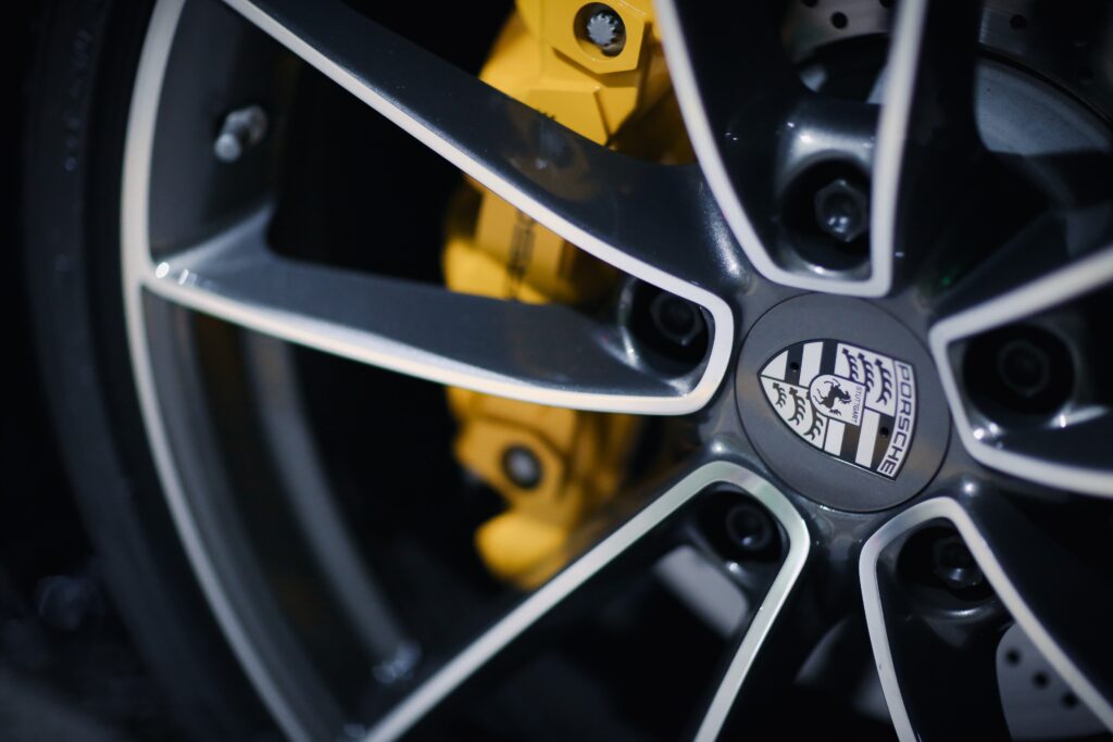 porsche wheel upgrade with yellow caliper